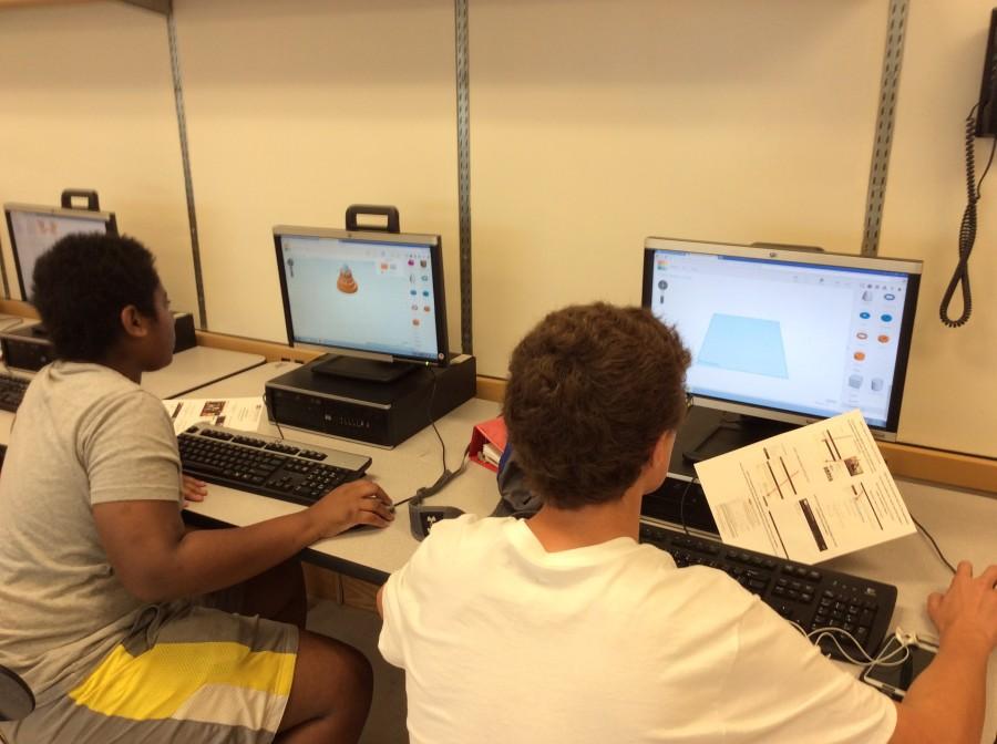 Students Lucas Jurek and David Blum working  on 3D projects in Tinker Cad