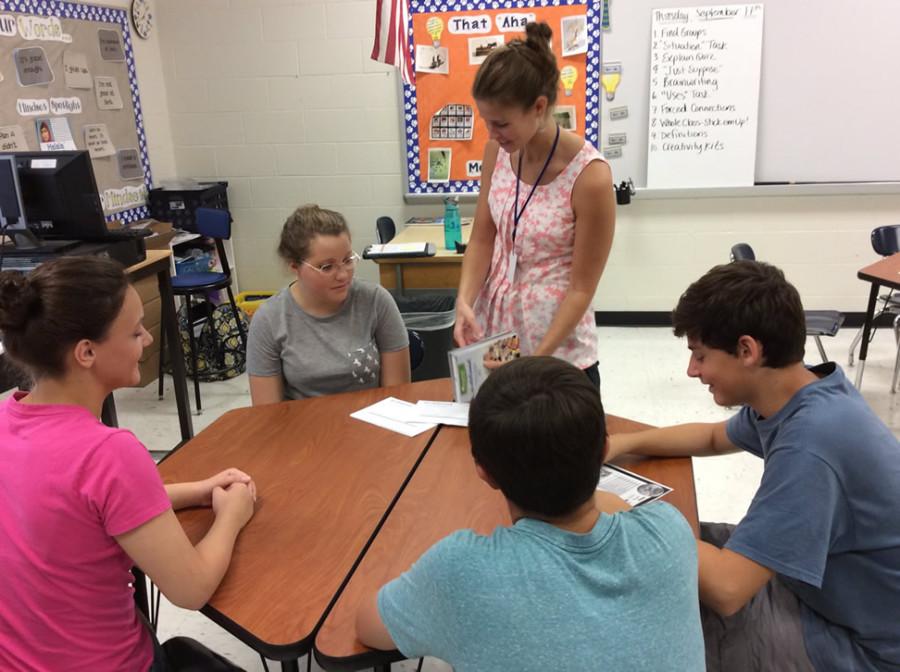 Miss. Ziegler works with Spanish Club students in the Innovation Lab at the High School