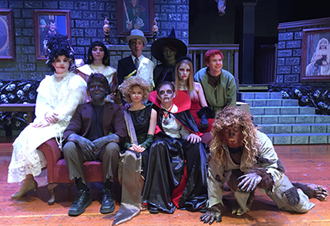 Featured above are the “monsters” from ‘Spook House’. Pictured left to right is:
Bridie (Brooke Strausbaugh), Cleopatra (Jocelyn Borynski), Frank (Everett Gilbert), Jekyll & Hyde (Carl Aldinger), Serpentine (Lily Hart), Hazel (Emma Retzlaff), Countess Dracula (Brooke Meyer), Count Dracula (Dylan Kiener), H.B. (Ian Johnson), and Harry (Joe Wallace) on the set of ‘Spook House’.