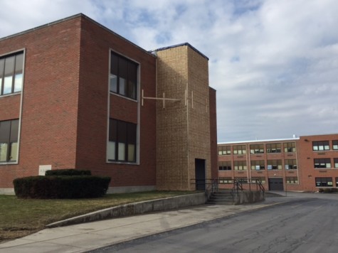 A temporary facade was recently installed at the Intermediate School bus entrance.